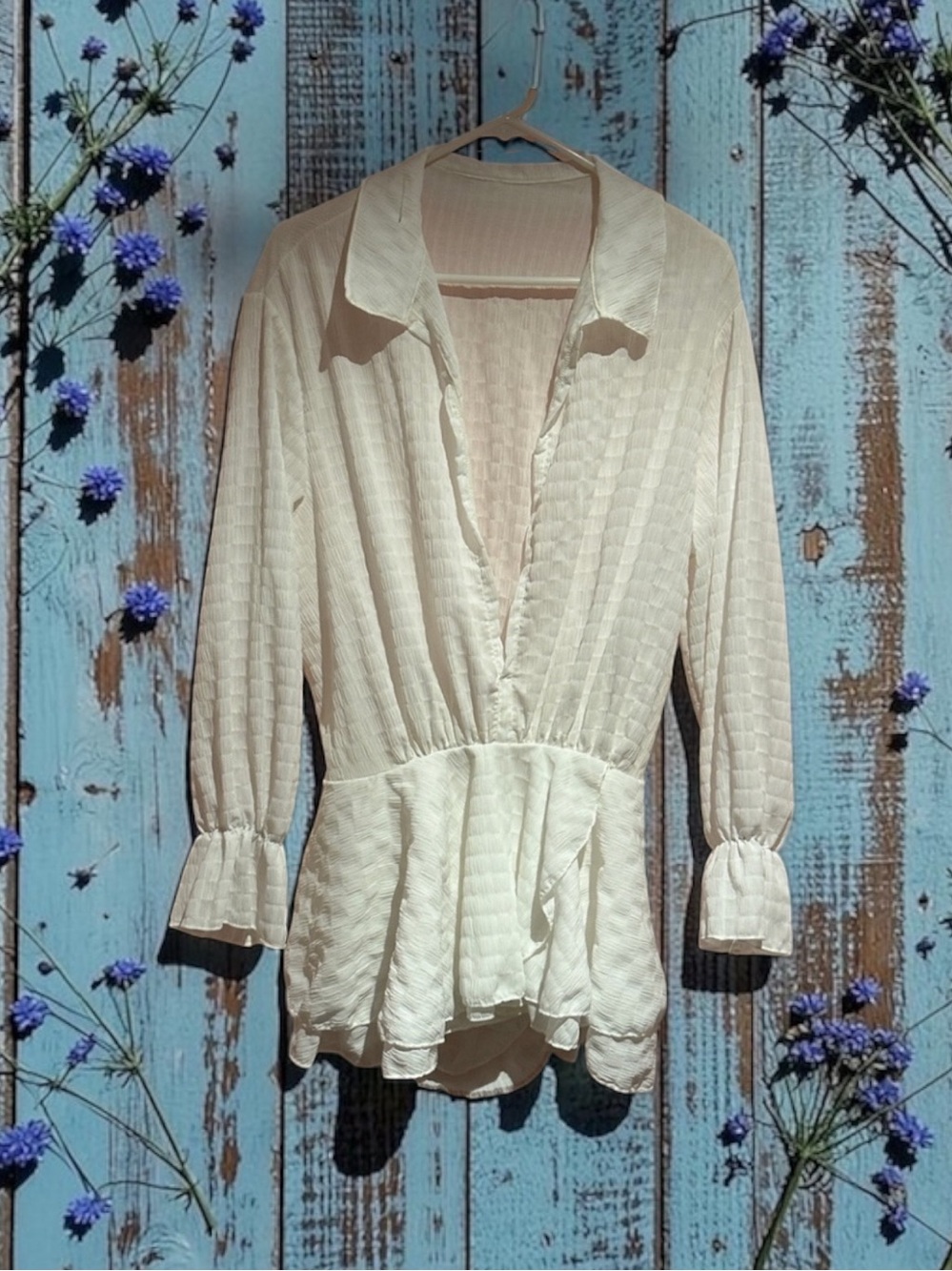 Deep plungeing peplum blouse